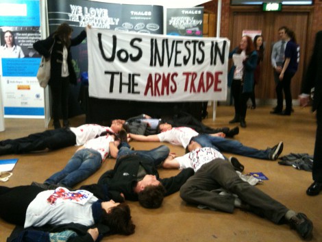 Sheffield students hold a 'die-in' outside arms company Thales' stall