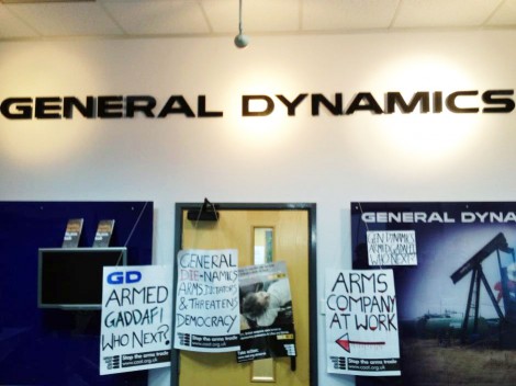Students add their own banners to the General Dynamics walls